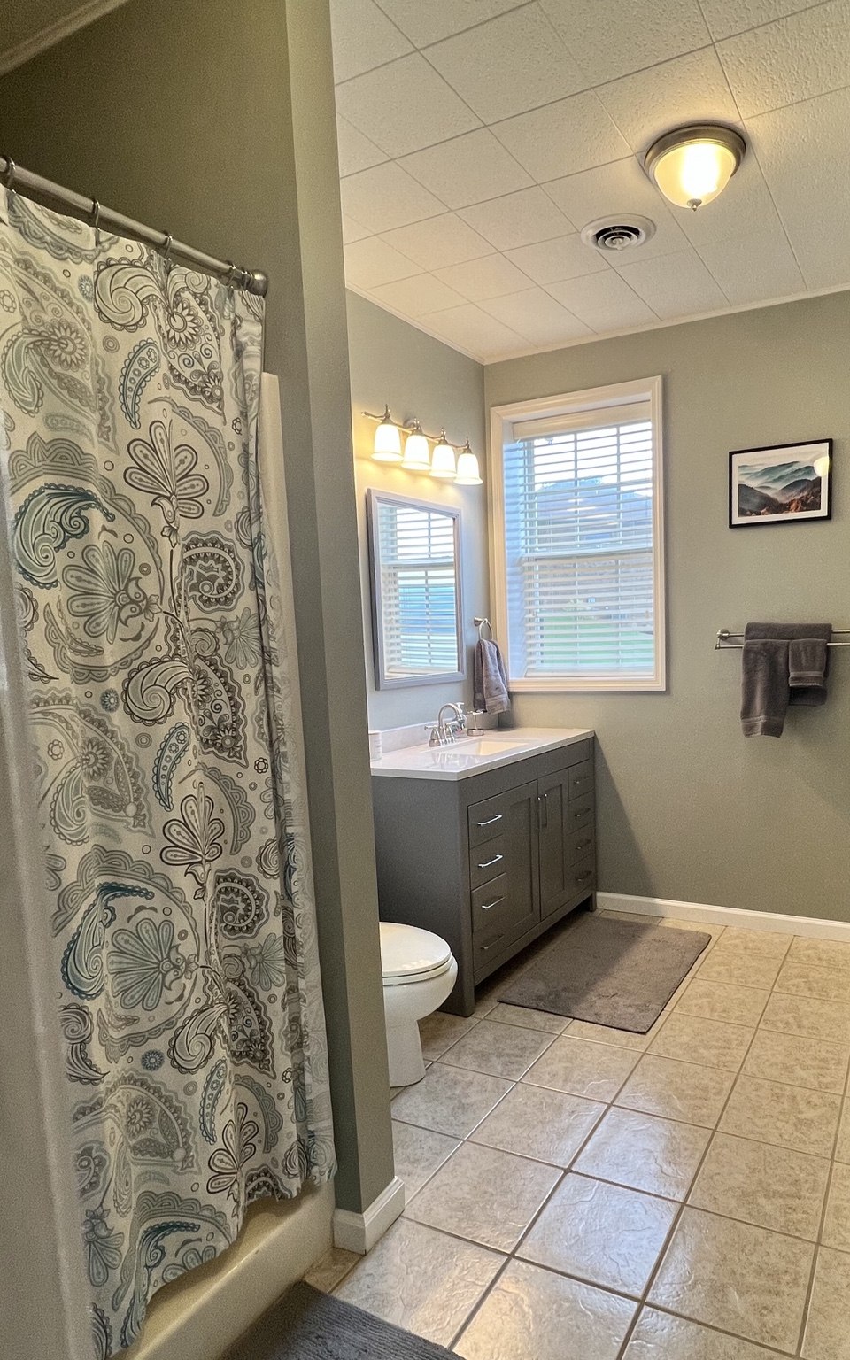 Downstairs full bathroom with entrances from the king bedroom and living area