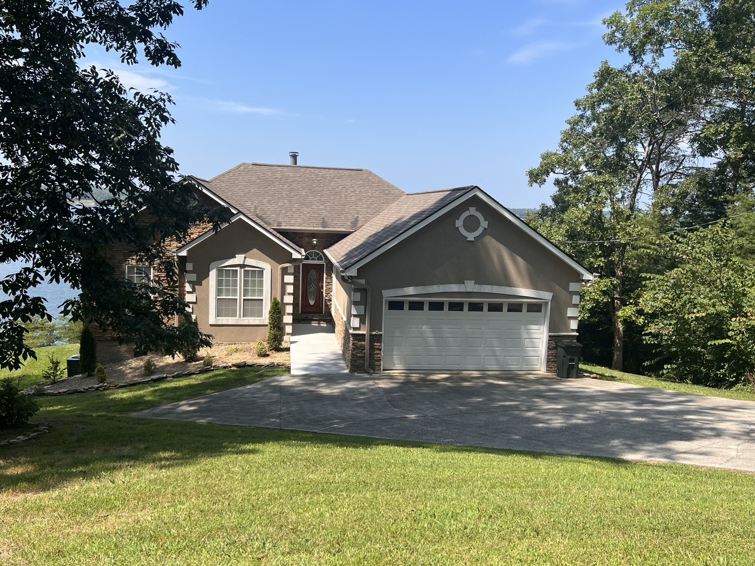 Front of the house showing the driveway, walkway and main entrance